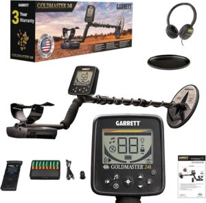 Garrett Goldmaster 24K metal detector with circular coil, digital display, headphones, batteries and accessory packaging