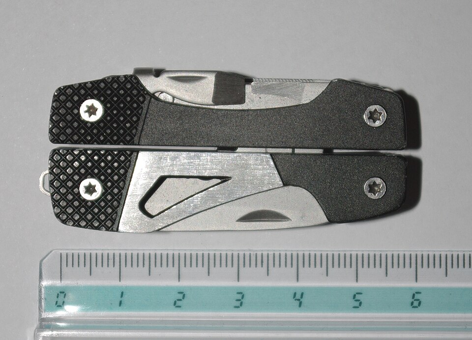 Gerber Vise black 31-000021 pocket multi-tool, folded next to ruler