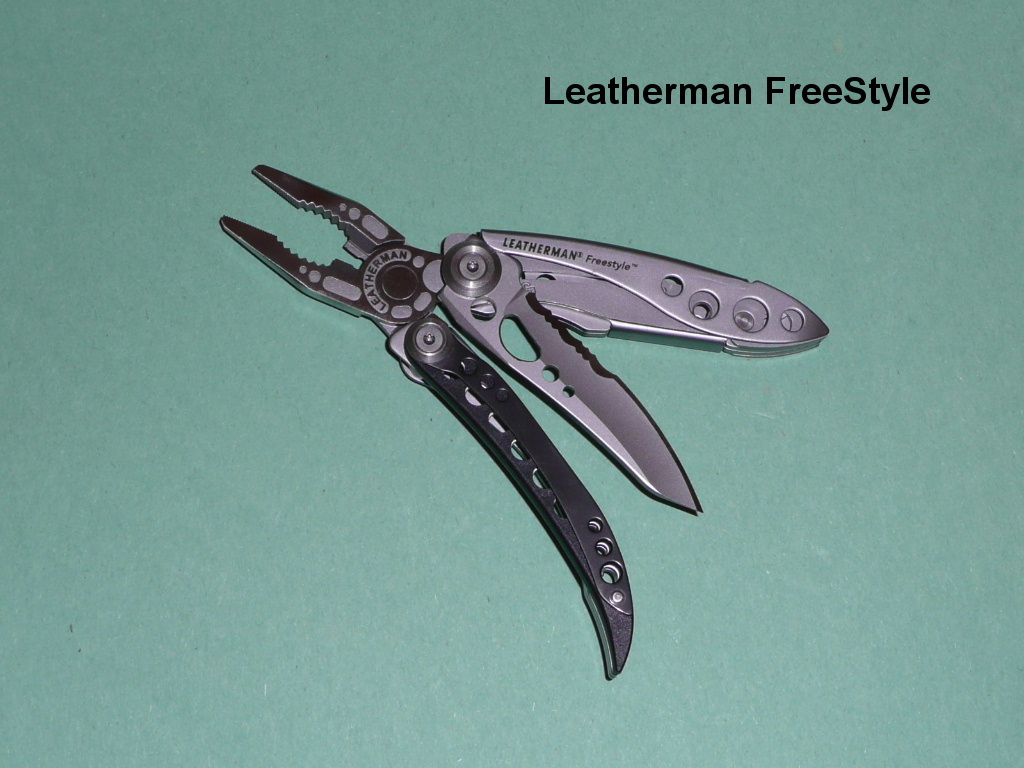 Leatherman Freestyle multitool with pliers opened and model name visible on handle