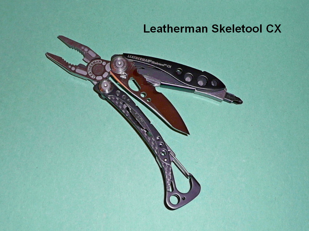 Leatherman Skeletool CX open with pliers, blade and bit driver; earlier black-and-stainless finish