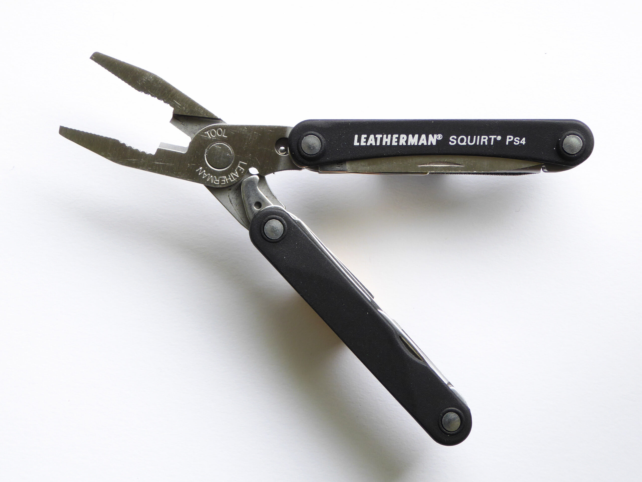 Black Leatherman Squirt PS4 keychain multitool with pliers opened