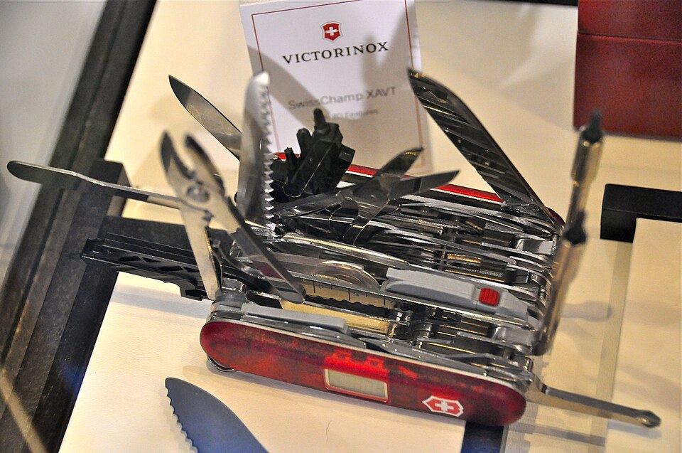 Victorinox SwissChamp XAVT red translucent multitool with its tools unfolded and model label visible